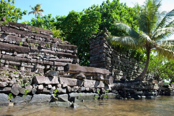 Ancient Stone Ruins by the Water The Ruins of Nan Madol, an ancient city built atop a coral reef