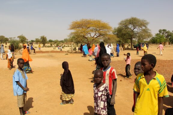 Local Residents in Niamey, Niger Niamey's locals hanging out at a popular favored social spot