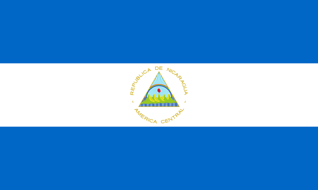 Flag of Nicaragua consisting of horizontal stripes in blue and white with the national coat of arms centered on the white stripe.