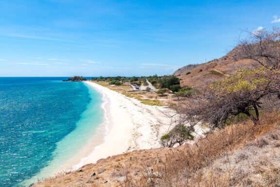 Tropical Beach with Clear Blue Water and White Sand One Dollar Beach, known for its affordability and simplicity