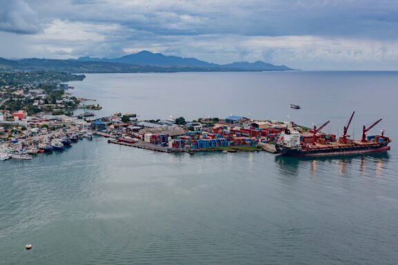 Aerial View of Honiara Port with Cargo Ships Port of Honiara, connecting the city to global trade routes