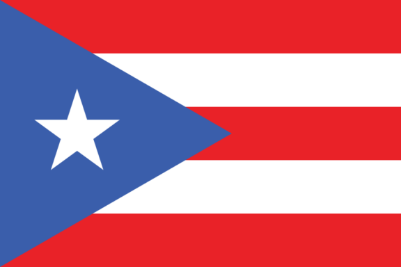 Flag of Puerto Rico with a blue triangle, white star, and red and white stripes.