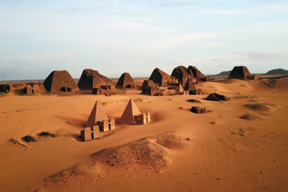 Sunset Over the Pyramids of Meroë in the Desert Begrawiya Meroe Pyramids, a testament to the Kingdom of Kush