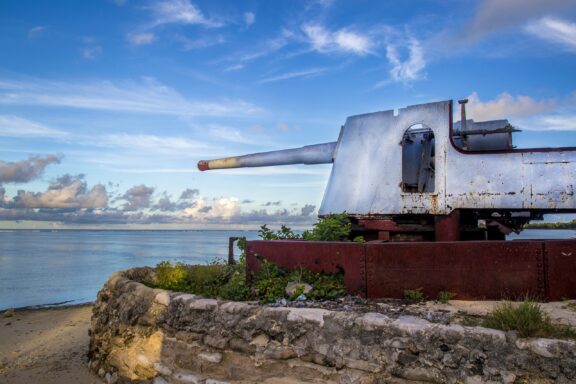 Coastal Landscape with Abandoned Tank Abandoned ruins of a tank on the Red Beach