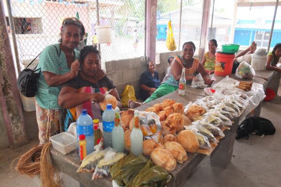Locals at a Market Stall Vibrant and bustling markets in Tarawa