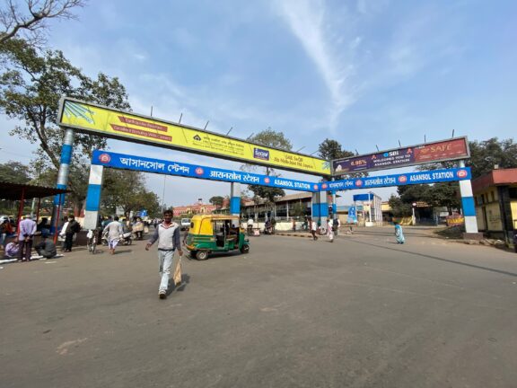 People gather at Asansol Station in Asansol, one of the most densely populated cities in the world.