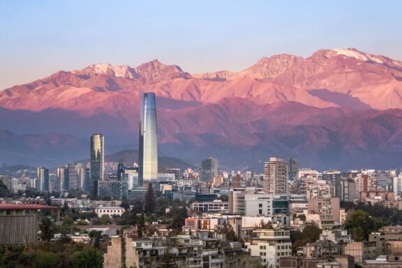 Aerial View of Santiago Skyline at Sunset with Andean Mountains in the Background The Andes Mountains form the backdrop behind the skyline of Santiago, Chile