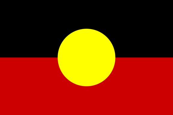 Australian Aboriginal flag consisting of a black top half, red bottom half, and a yellow circle in the center.