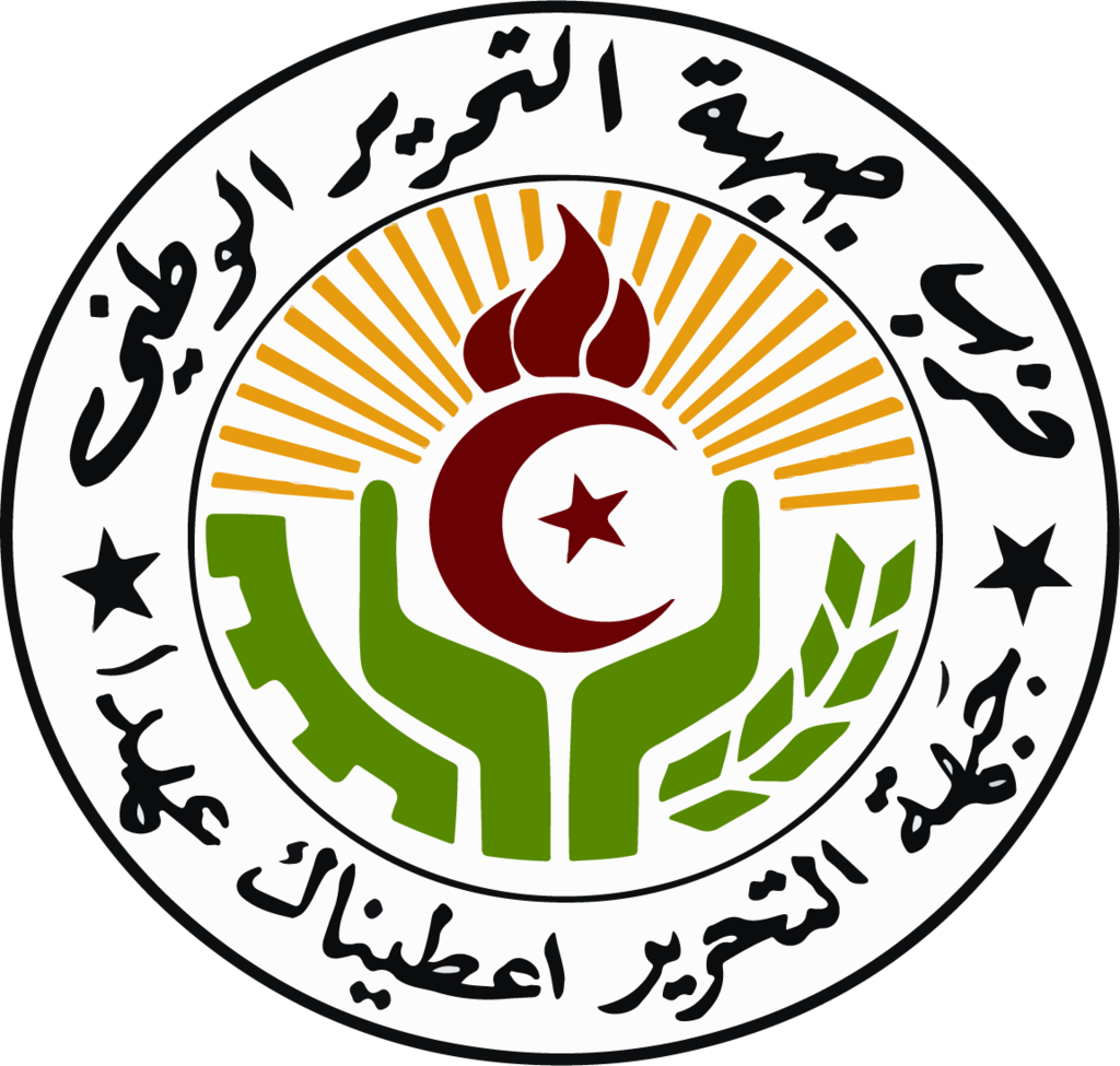 Circular emblem with a hand, a red star, and Arabic script.