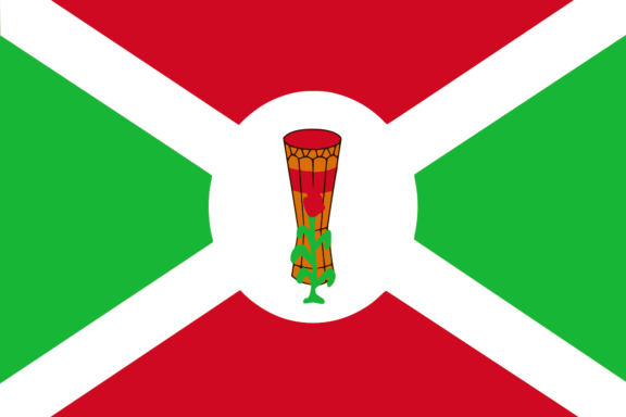 A historical flag of Burundi with a white saltire dividing green and red fields and a central white circle featuring a drum with a sorghum plant.