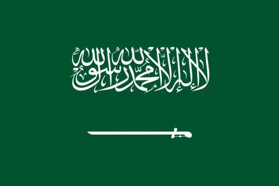 Flag of Saudi Arabia featuring a green field with white Arabic inscription and a sword.