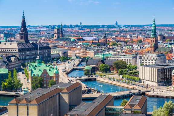 The skyline of Copenhagen, Denmark can be seen on a clear summer day.