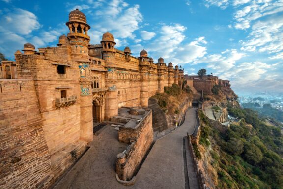 A view of the side of Gwalior Fort and the countryside in the distance in Madhya Pradesh.