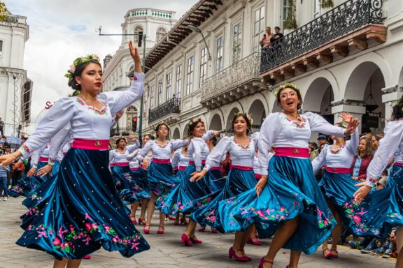 Women folk dancers dancing in Cuenca, Ecuador.