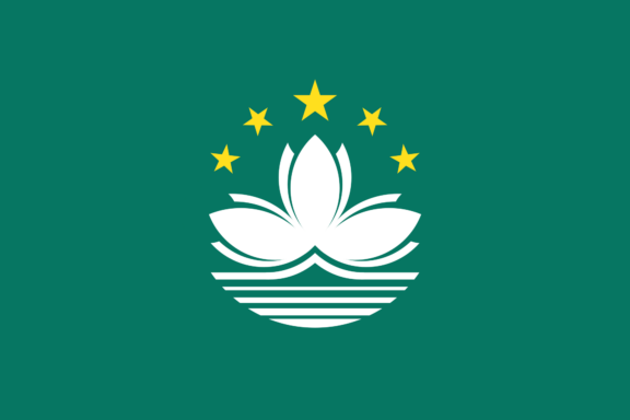 Flag of Macau featuring a green background with a white lotus above a stylized bridge and water, flanked by five stars.