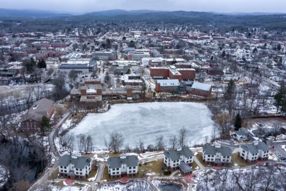 An aerial view of Keene State College with snow and ice on the ground.