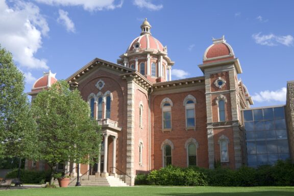 A low-angle view of the Historic City Hall building in Hastings, Minnesota, the Dakota County seat.