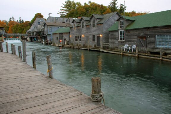 Small, wooden buildings line the water at Leland’s historic Fishtown.