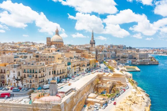 An aerial view of the Valletta skyline and coast.