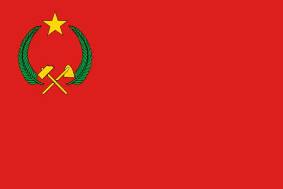 Red flag with a gold star in the upper left corner, crossed golden hammer and sickle in the center, surrounded by a green wreath.