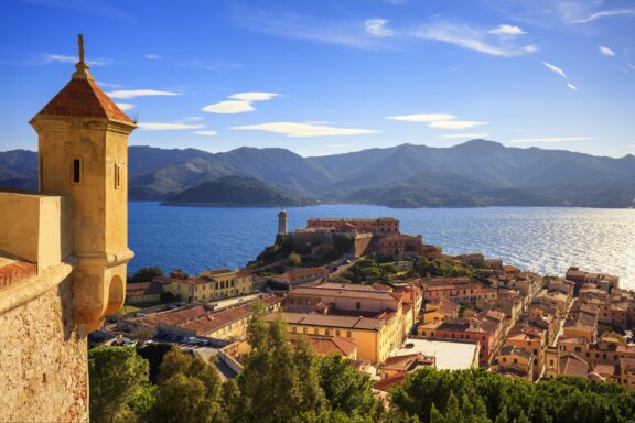 A view of the roofs of buildings and the sea around Portoferraio on the island of Elba, Italy.