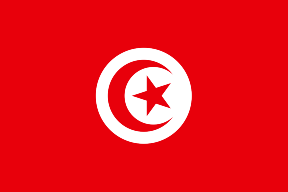 Flag of Tunisia with a red background, a white circle in the middle containing a red crescent moon encircling a red star.