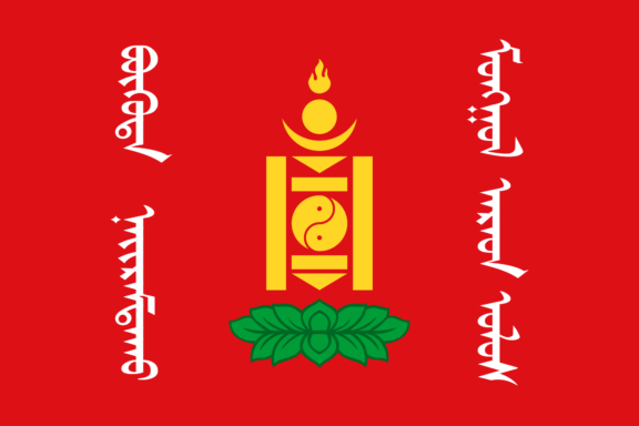 Red flag with a golden Soyombo symbol in the center above a green lotus, flanked by golden Tibetan script.