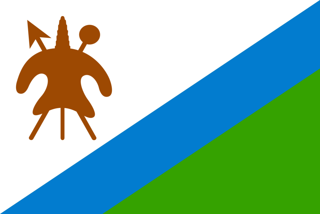 A flag with a diagonal white stripe dividing blue and green fields, and a brown traditional Basotho shield with a lance and club on the upper left.