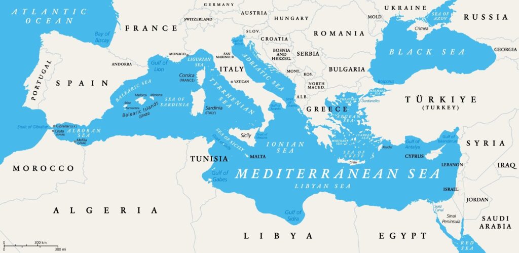 The Mediterranean Sea subdivisions, political map with straits, countries and the Black Sea. Connected to the Atlantic Ocean, surrounded by the Mediterranean Basin, almost completely enclosed by land.