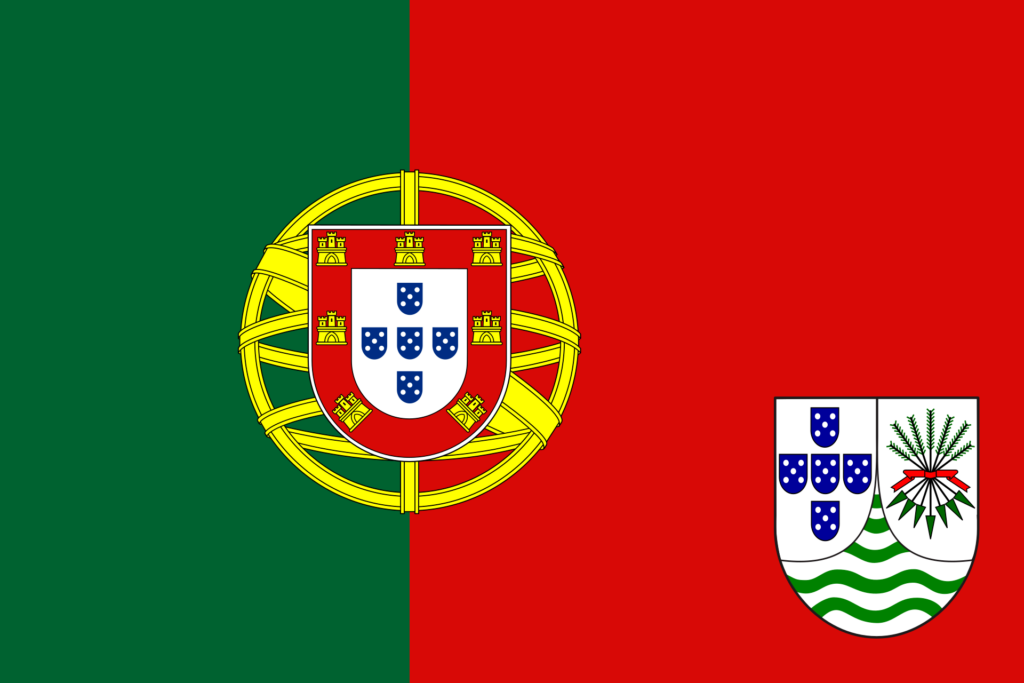 Flag of Portuguese Mozambique with a green and red field, the Portuguese shield over a yellow armillary sphere on the left, and a white shield with blue waves and a green strip with a white star and black silhouette of a plant on the right.