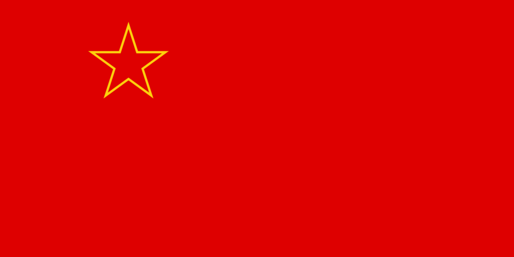 Flag of the Socialist Republic of Macedonia with a red field and a yellow-bordered red star in the upper left corner.