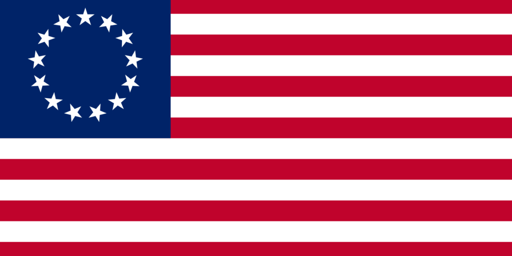 Historical American flag with 13 stars arranged in a circle representing the original 13 colonies.