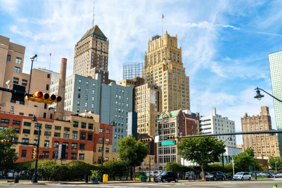 A low-angle view of tall buildings in Essex, New Jersey on a sunny day.