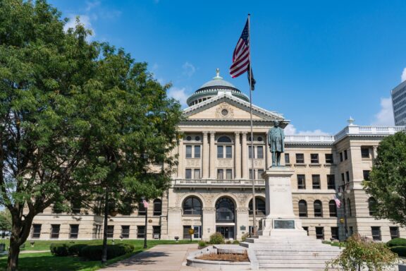 A low-angle view of the façade of the Lucas County Courthouse.