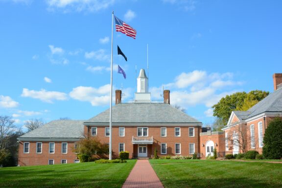 An American flag stands tall in front of the municipal building of Westfield, New Jersey in Union County.