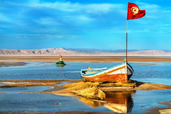 Boat on Chott el Djerid, an endorheic salt lake in Tunisia