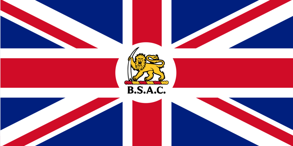 A historical flag with a Union Jack background and a central emblem featuring a lion and the initials B.S.A.C.