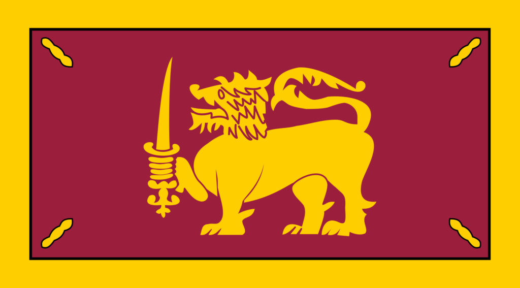 Flag of Ceylon Dominion featuring a lion holding a sword on a maroon background with four bo leaves in each corner, all within a yellow border.