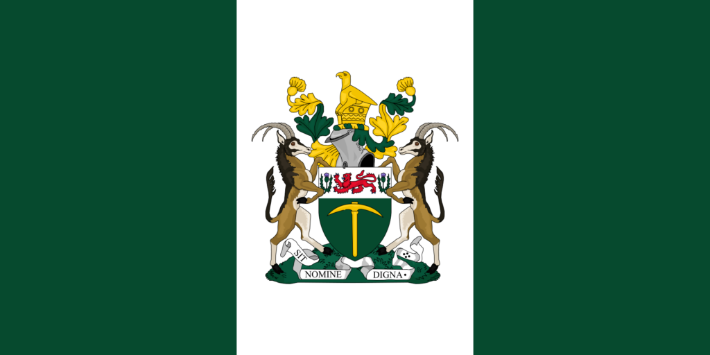 Flag of Rhodesia with a green and white field and a central coat of arms featuring a lion and thistles.