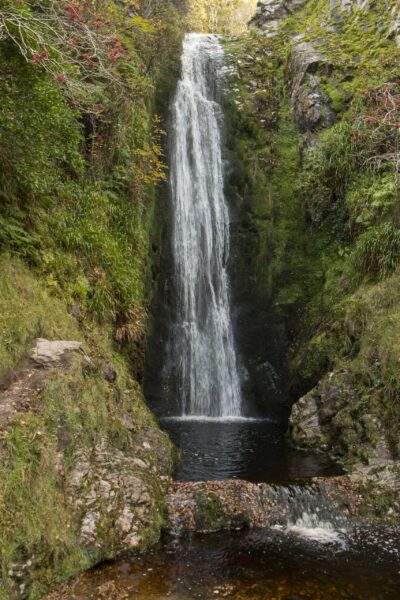 Glenevin Waterfall, a cascading melody set in emerald serenity