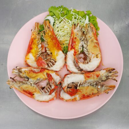 Grilled river prawn goong maenam pao in thai name sliced