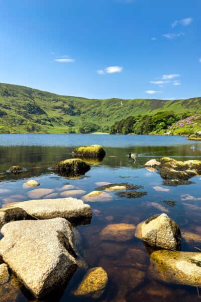 The Lough Bray, a mirror to the sky, cradled in mountain arms