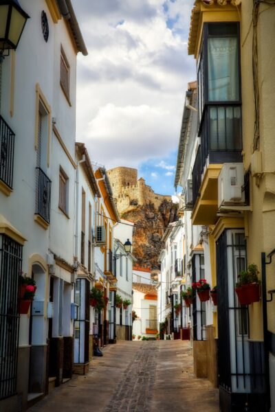 Olvera's silhouette, a dance of olive groves and medieval stones