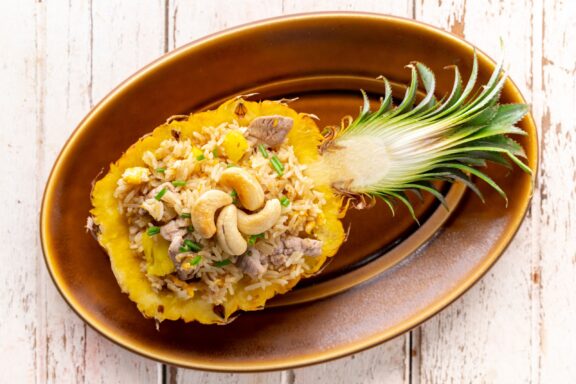 Pineapple fried rice with pork egg garlic onion spring onion