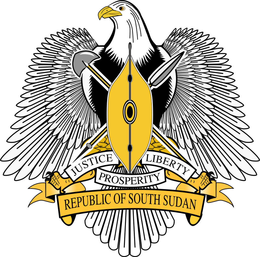 Coat of arms of South Sudan featuring an eagle with spread wings behind a shield with a spear and a spade, and a scroll with the words "Justice, Liberty, Prosperity, Republic of South Sudan".