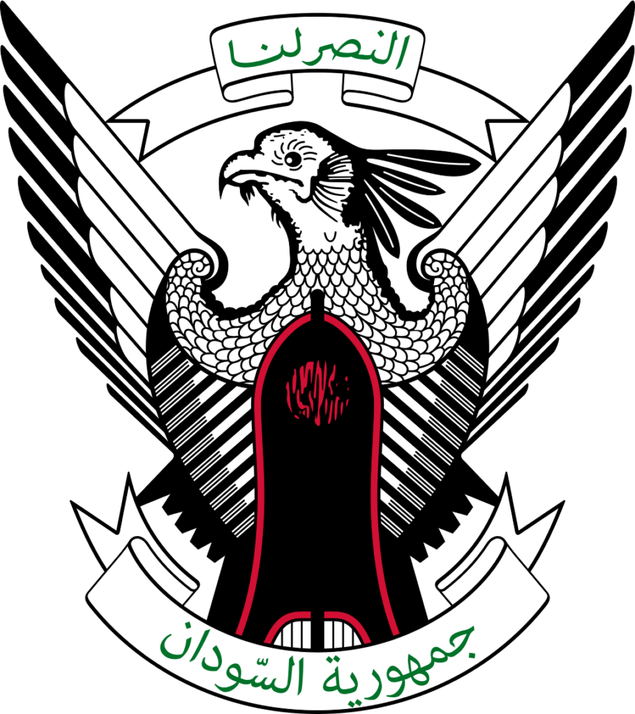 The national emblem of Sudan featuring a secretary bird with spread wings atop a shield, with a scroll bearing the national motto in Arabic script.