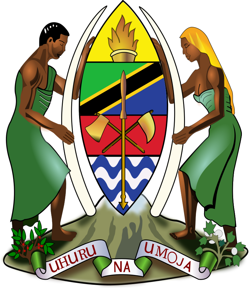 Coat of arms of Tanzania featuring a shield with a warrior on each side, a torch on top, and the Swahili words "Uhuru na Umoja" at the bottom.