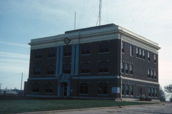 A low-angle view of the brick courthouse in Buffalo, Oklahoma.