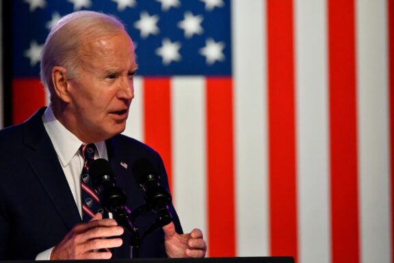 Joe Biden stands in front of an American flag in Blue Bell, Pennsylvania.