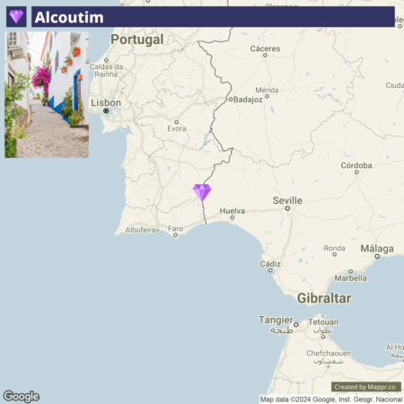 An online map showing the geographical location of Alcoutim in Portugal, highlighted with a purple diamond icon, with parts of southern Portugal and southwestern Spain visible on the map.